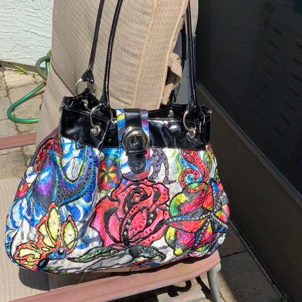 NEW WITHOUT TAGS SPY PRINTED FABRIC SHOULDER BAG WITH RHINESTONES